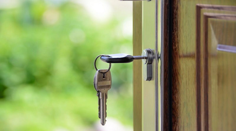 Keys Hanging in Front Door of Home