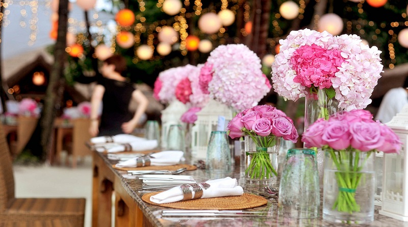 Beautiful Wedding Reception Table, with Pink Floral Arrangements - How to Find the Perfect Wedding Venue