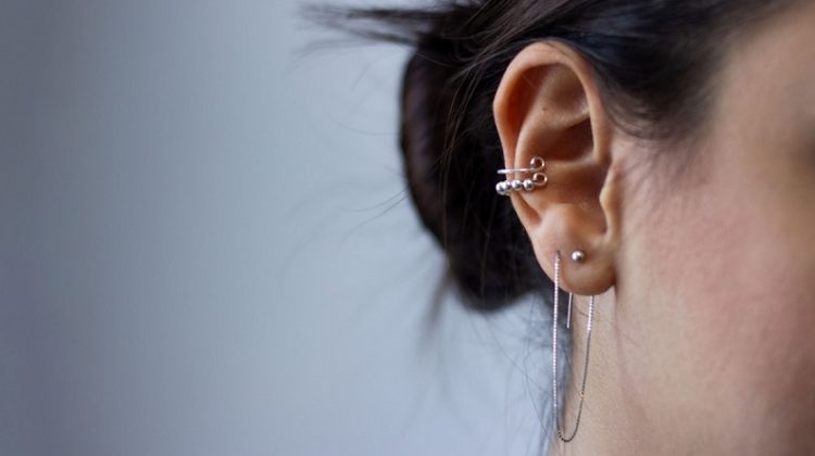 Woman's ear with multiple piercings -The Cutest Ear Piercings