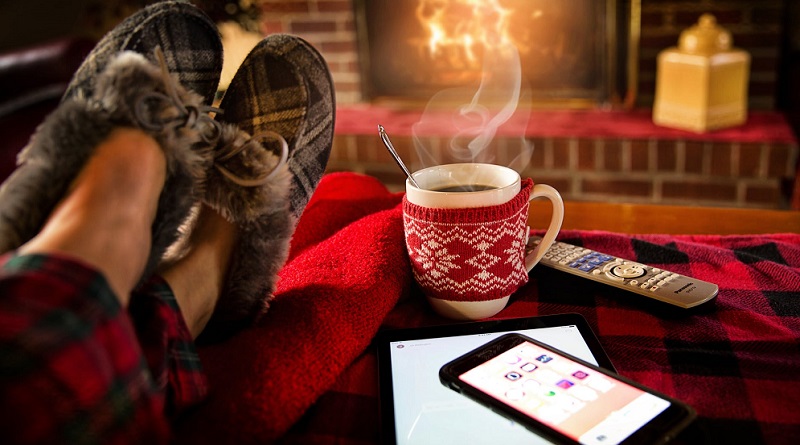 Feet up in front of a warm fire - Winter Safety Precautions