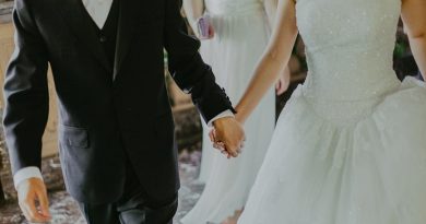 Bride and Groom Holding Hands - Wedding Essentials
