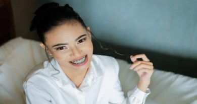 Smiling woman with braces -