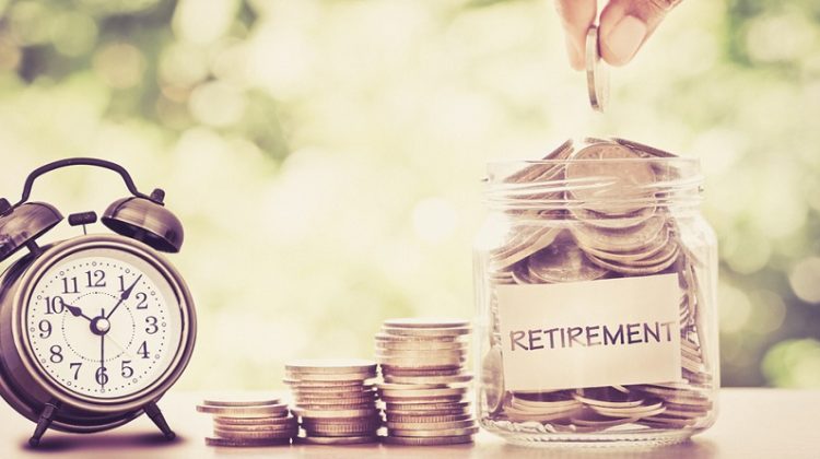 Alarm Clock and Jar with Coins -Why It’s Never Too Early to Think About Retirement
