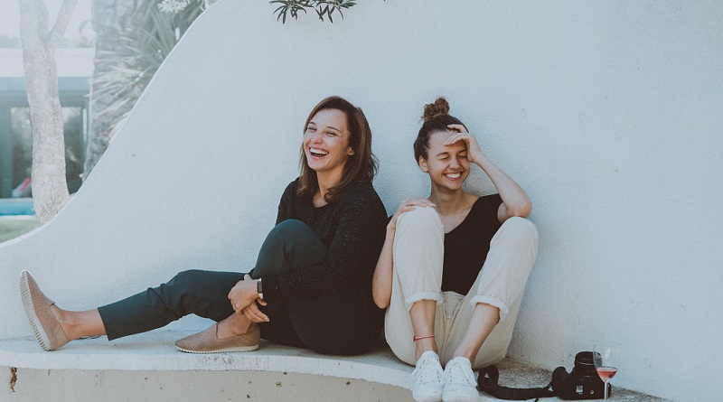 Two Smiling Women - Warming Your Soul Is A Radiant Self-Care Tactic