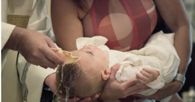 Baby Being Baptized - What Is a Christening and How Is It Different From a Baptism?