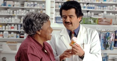 Woman Consults with Pharmacist - Human Error at any Pharmacy