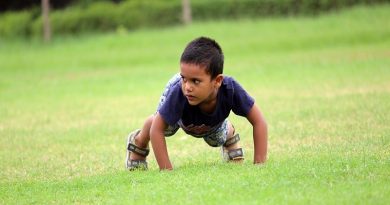 Little Boy on Grass - Helping Your Children Overcome Common Difficulties