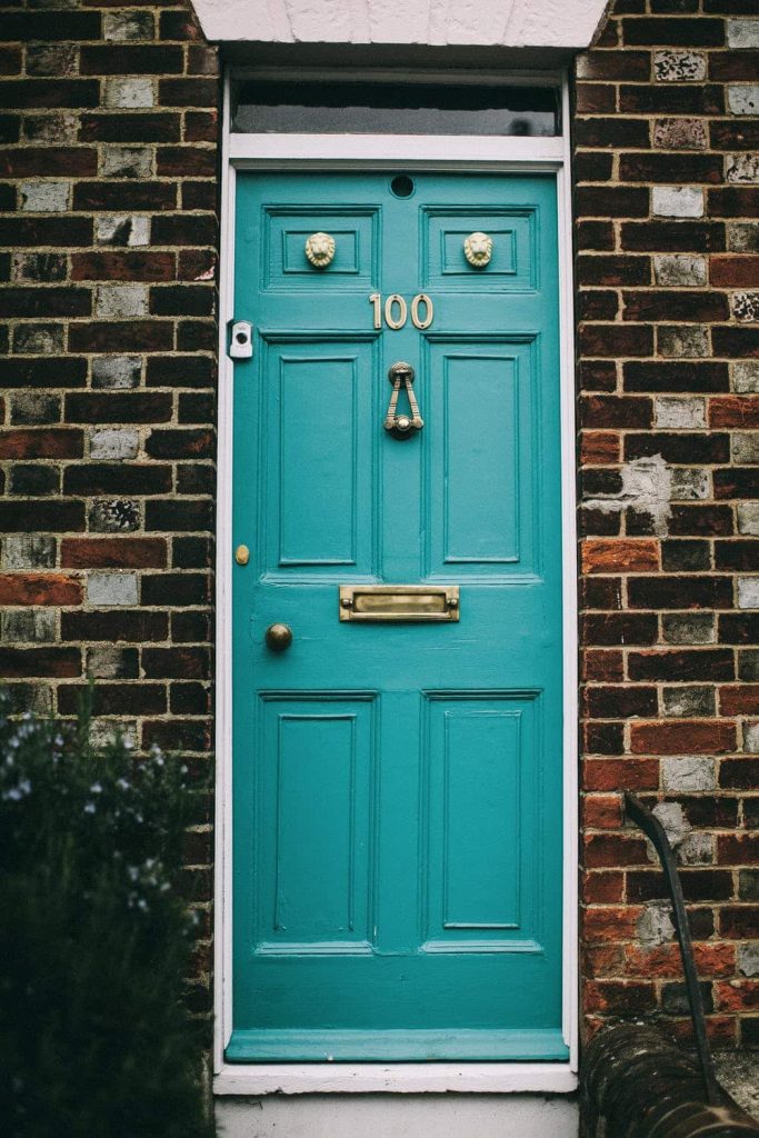 Brick Wall with Teal Door