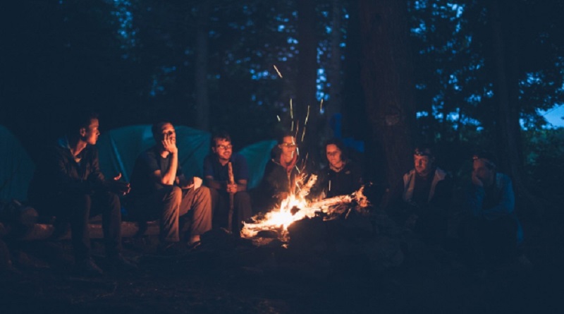 Group of Friends Around a Camp Fire - Make the Most of a Camping Adventure