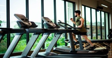 Man running on treadmill in gym - Cultivate Better Habits