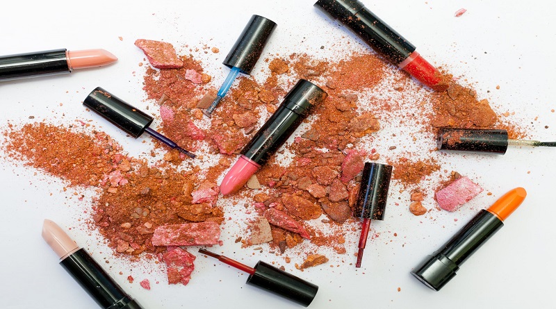 Open lipsticks crushed blush and nail polish brushes - Health & Beauty Products To Avoid