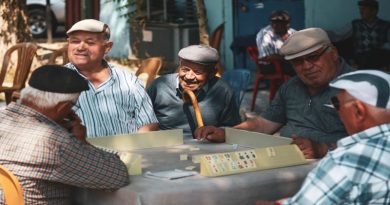 Older Men Around a Table - Senior Living Communities
