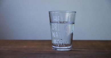Drink Water More Glass on Wood Table - Benefits of Drinking More Water