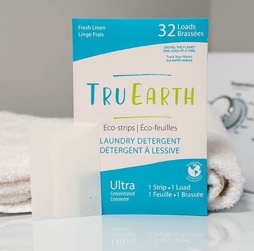 Package of Tru Earth Laundry Strips on top of Washing Machine 