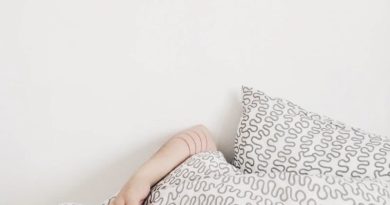Person Sleeping under White and Gray Sheets - Uninterrupted Sleep