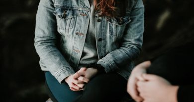 Woman in jean jacket and man - Hiring a Couples Counselor