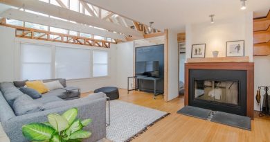 Bright Open Living Room with Light and Dark Wood Beams - Home Situations You Never Want To Experience