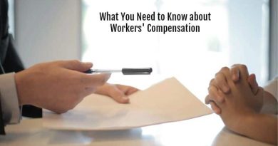 Hands Across Desk with Paper and Pen - Workers' Compensation