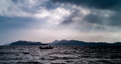 Boat on the water at dusk - Maritime Injury
