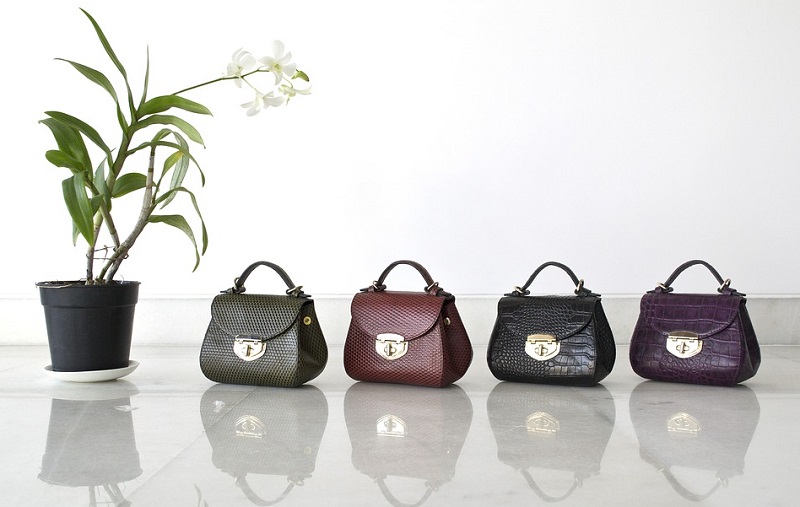 Handbags on Shiny Tabletop Gift Ideas To Consider For Any Woman’s Birthday