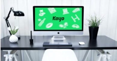Desk with Kayo Sports on Computer Screen