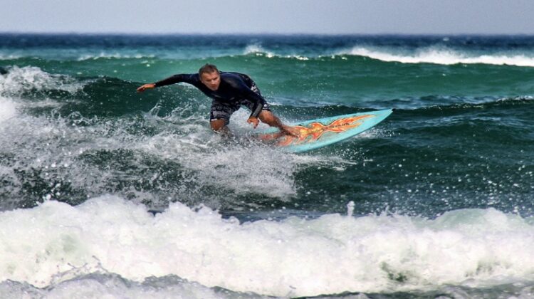 Best Surfing Watches Man surfing