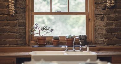Country Kitchen with exposed brick and farmhouse sink
