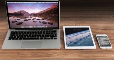 Laptop, tablet, and smart phone on table