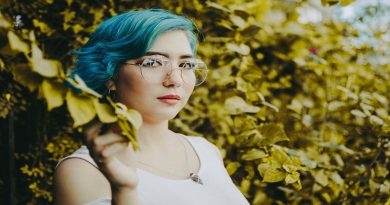DIY Your Hair Color Woman wearing glasses with blue hair