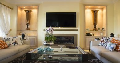 Spruce Up Your Home Living Room with Two Sofas, Glass Coffee Table, Large Rug and Fireplace with Flat Screen TV
