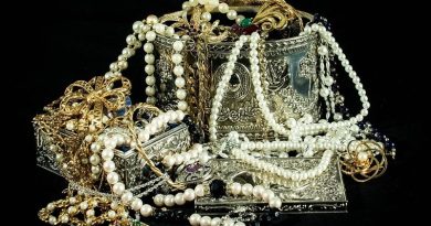 Silver jewelry boxes filled with jewelry pieces of all kinds