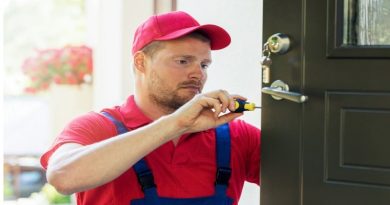 5 Tools Every Locksmith Should Have Locksmith working on a door