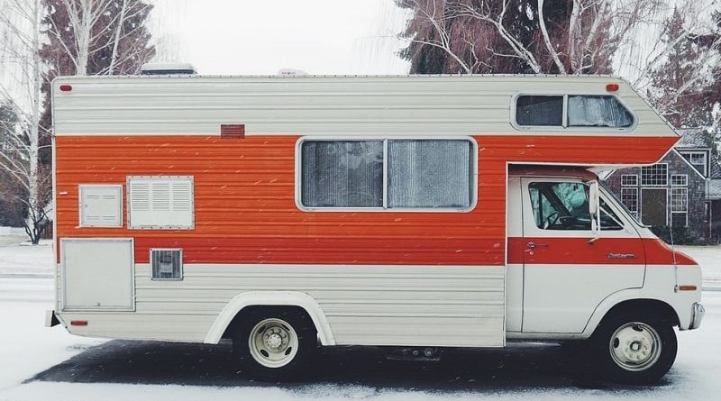 r4 Safety Tips for Women Traveling Solo on Campervans ed and white over cab camper