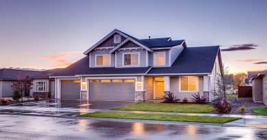 Your Home Has Been Caught In A Natural Disaster 2 story Grey Home with 3 car garage, after it's rained
