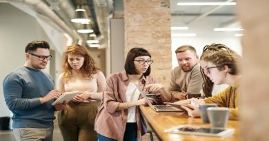 Give Back to Your Employees Employees working together in office