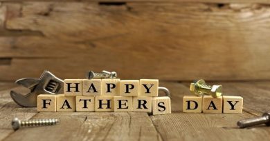 Happy Fathers Day in wood tiles with screws and wrench on wooden surface