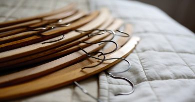 coat-hangers on bed