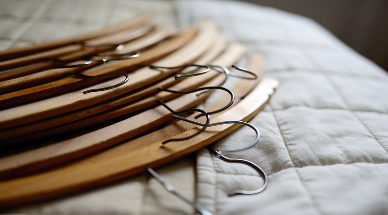 coat-hangers on bed