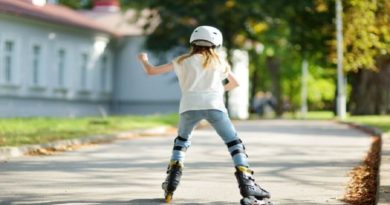 Get Your Child More Active Outdoors Little girl rollerblading in the park