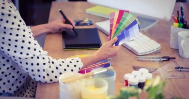 Benefits of Interior Design Services Interior Designer working on plan