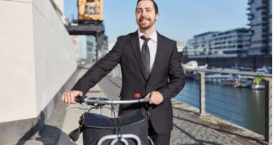 Changes You Can Make to Protect Our Planet Man in a Suite with his Bike