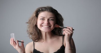Boost Your Career in the Beauty Industry Smiling Woman Putting on Makeup