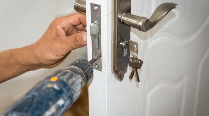 Need A Locksmith / Locksmith installing new locks on door