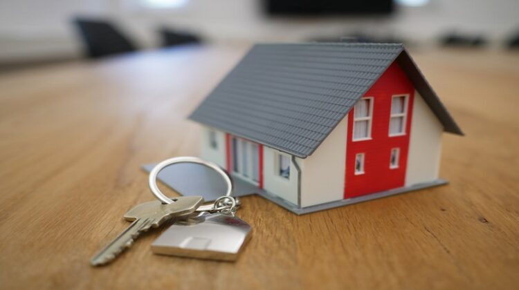 Viewing Your Potential Next Property / Set of keys by small model of a house
