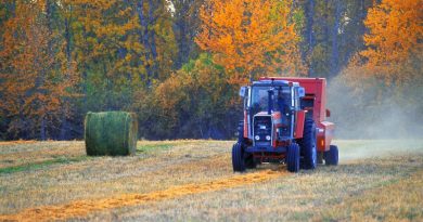 Different Types of Farming Equipment / Tractor in a Field