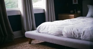 Bedroom with Low Platform Bed with White Bedding
