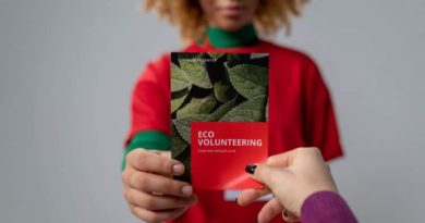 Printing's Importance to a Company's Success / Two People holding a business brochure