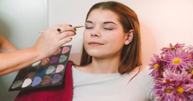 Escape From Everyday Routine / Young brunette woman getting her makeup done