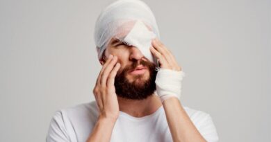 Facial Trauma - Bearded Young Man wrapped in bandages