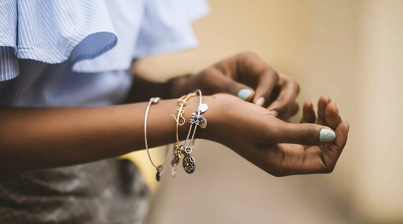 Inheriting A Beautiful Jewelry Piece / Woman wearing several delicate bangle bracelets
